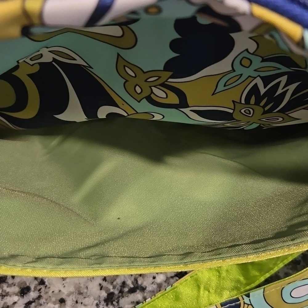 JU JU BE MESSANGER DIAPER BAG. GREEN, BLUE AND WHITE PAISLEY  AND FLORAL.